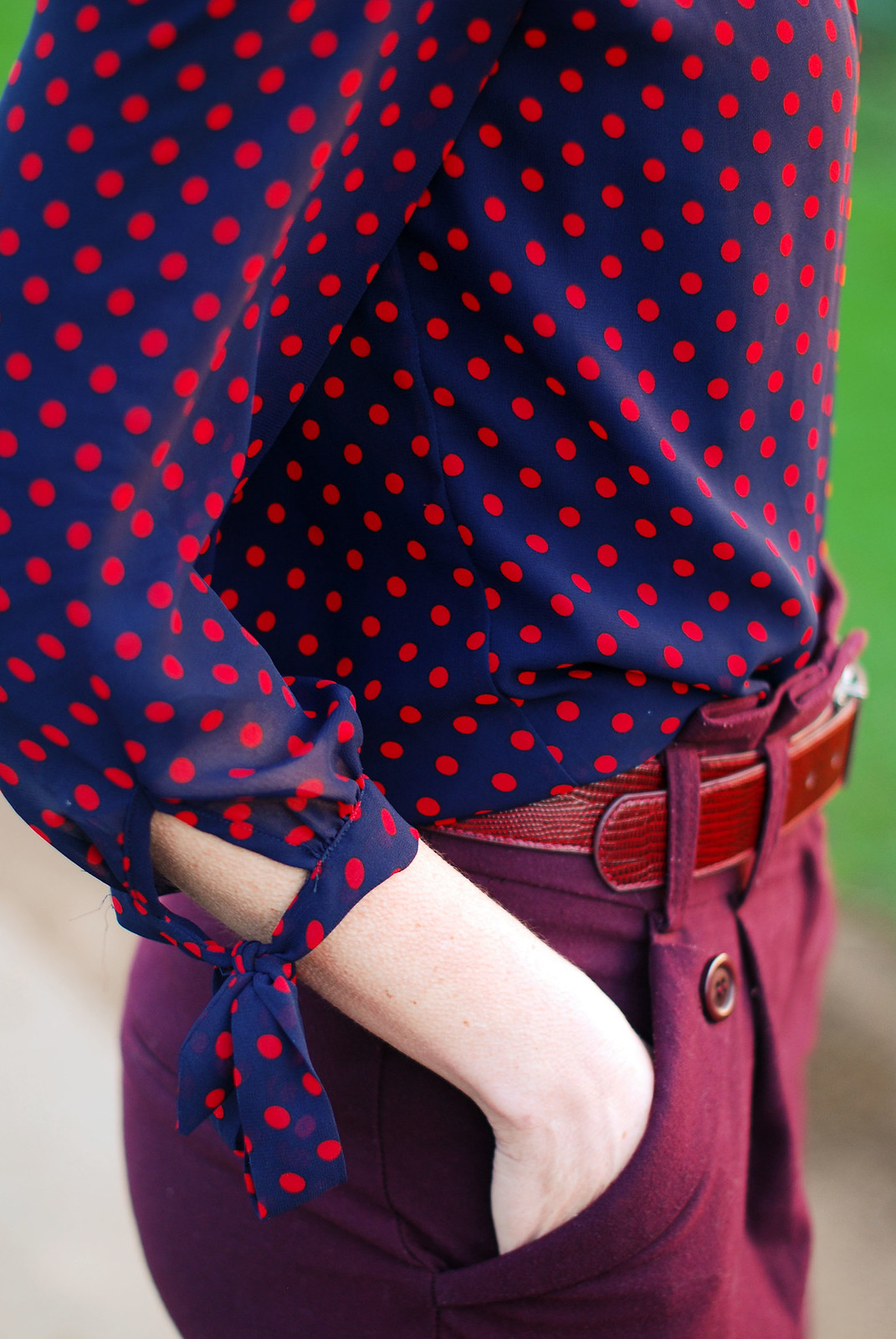Easy-to-wear colours of plum and navy blue: Red and blue polka dot blouse plum peg leg trousers silver pointed toe slip trainers | Not Dressed As Lamb, over 40 style