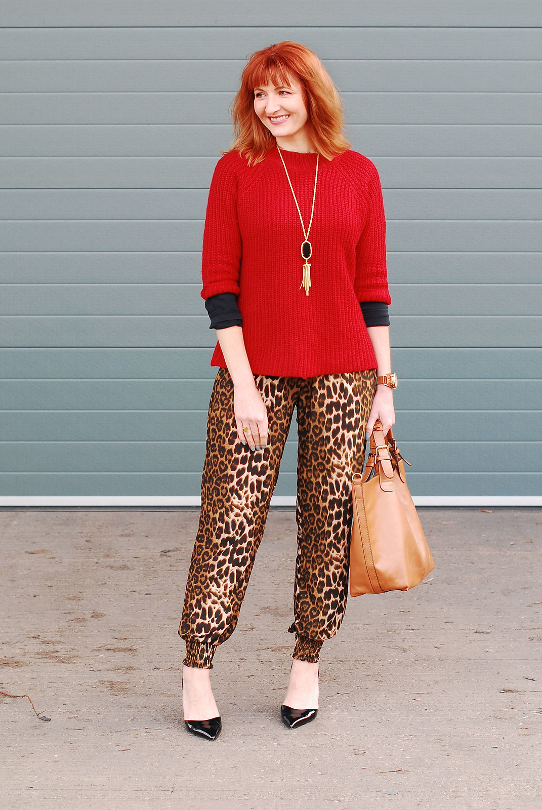 Bold autumn/fall/winter outfit: Red three quarter sleeve sweater, leopard print joggers, pointed black heels | Not Dressed As Lamb