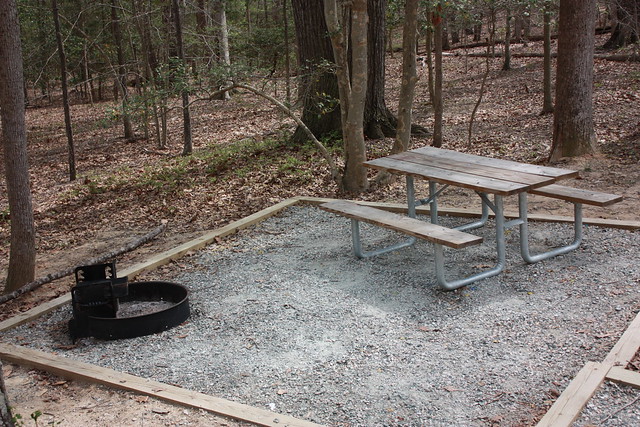 Picnic table and fire-pit with cooking grill for Yurt #1 at Pocahontas State Park, Virginia