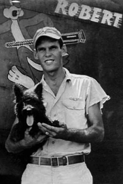 Lt. Robert L. Mosely at Hollandia with dog