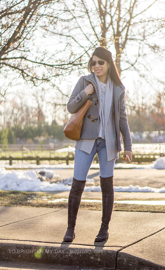 gray duffle coat with toggles, gray open cardigan sweater, lace top, lightwash skinny jeans, cognac brown tote, gray suede over the knee boots