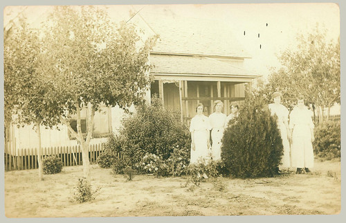 Five young women in the front yard
