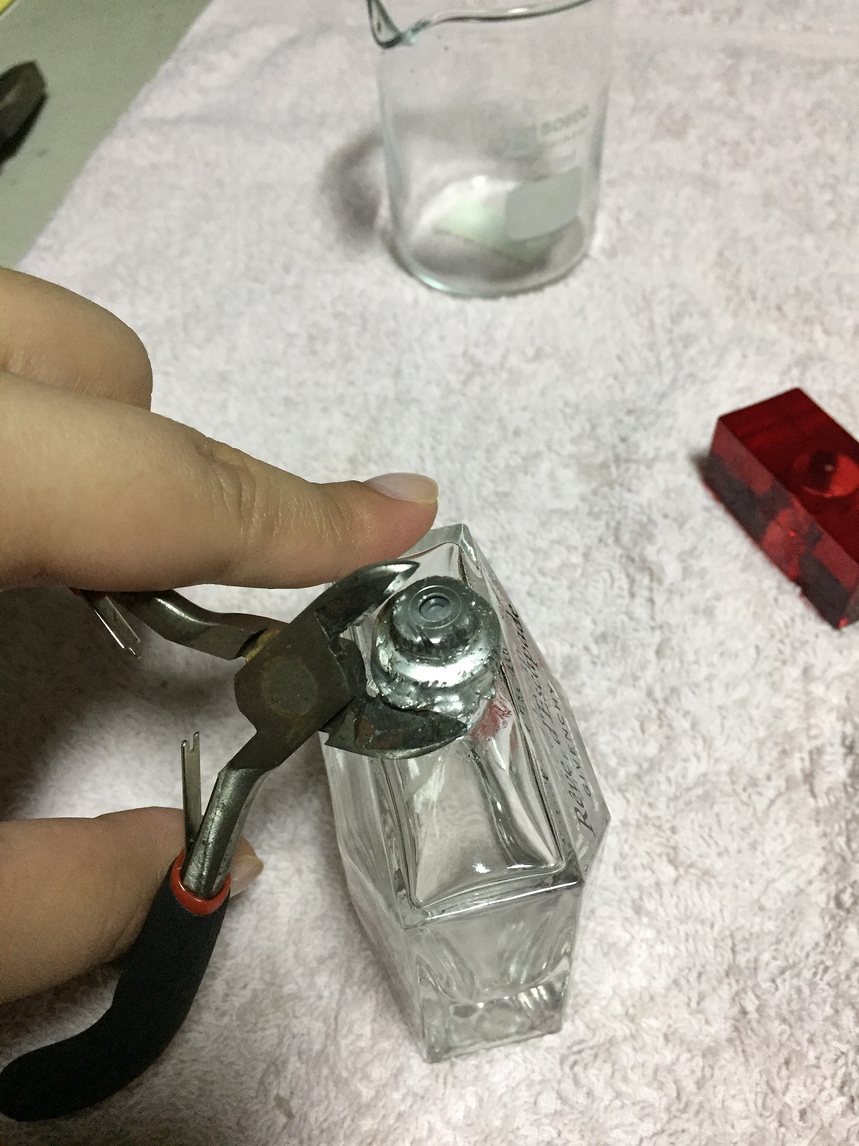 How to Take the Top off a Cologne Bottle  