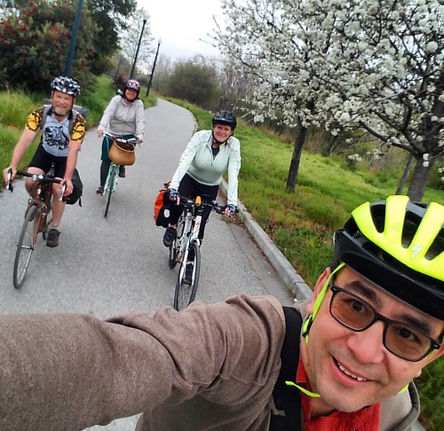 Riding through plum blossoms with San Jose Bike Train.  San Jose trails users: city crews are now clearing mud from under Hwy 101 on the Guadalupe River Trail so please slow down and follow their instructions.   #commutebybike #bikecommute #commute #cycli
