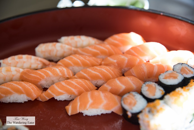 Salmon nigiri, salmon maki rolls, and ebi (shrimp) nigiri