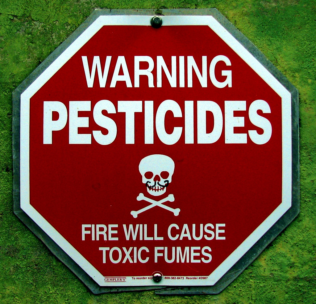 A sign warning about pesticide exposure. Van Ness Avenue, San Francisco, CA, 15 August 2006