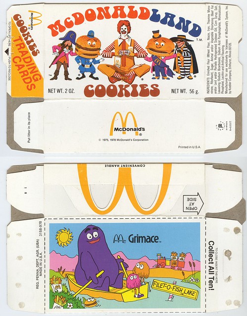 1978 McDonalds MCDONALDLAND Cookies empty box with a Ronald McDonald bike card 