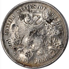 Chopmarked 1873-CC Trade Dollar reverse