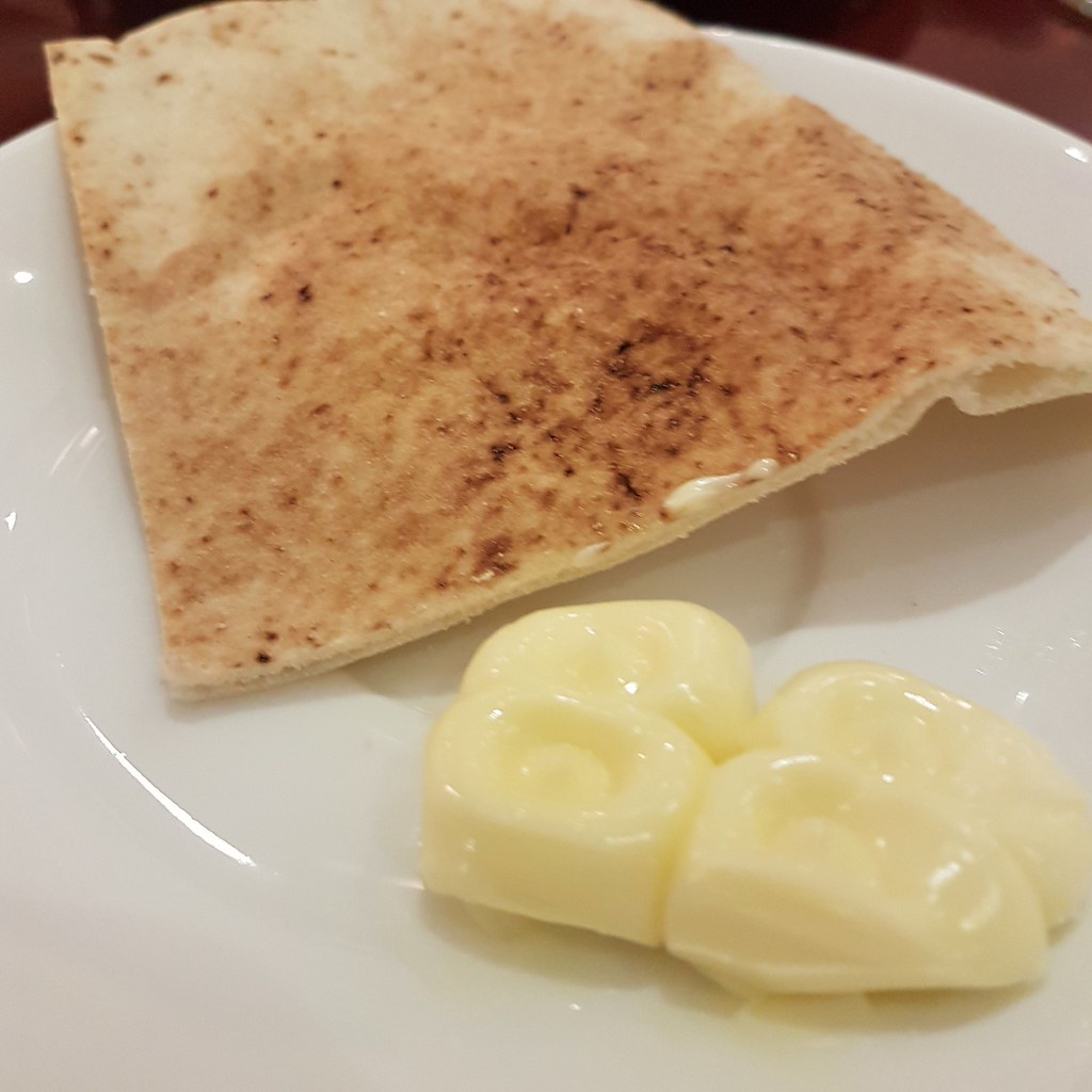 Arabic bread served with butter @ Al Safir Hotel And