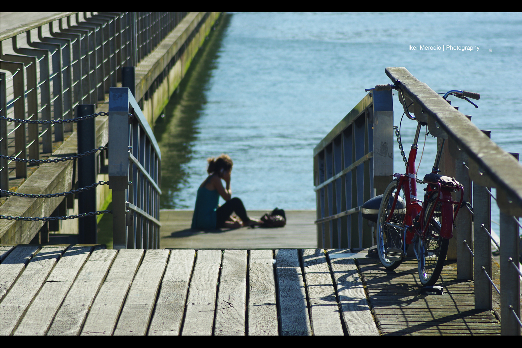 Red Bicycle and Girl in Quay