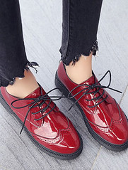 Red patent brogues