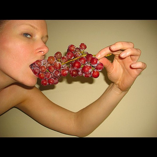 #tbt self-portrait with grapes, 2009. I painted this photo and then sold the painting! 🍇