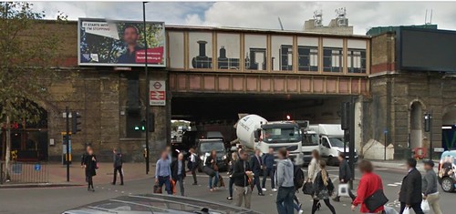 Mural of historic train on a bridge at the Vauxhall Underground Station, London