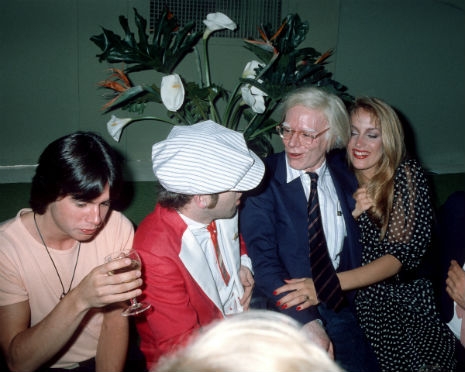 Elton John, Andy Warhol and Jerry Hall at Grace Jones’ 30th birthday party in 1978