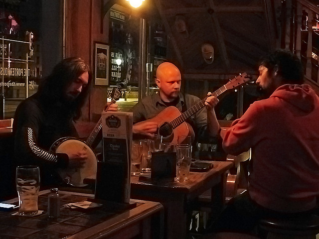 Musicians tuning up at the Porterhouse Temple Bar, a brewpub in Dublin, Ireland