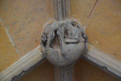 Porch boss: dog with a rabbit (15th Century)