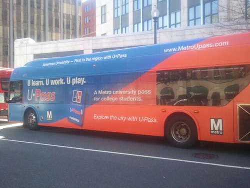 WMATA bus livery promoting the American University student transit pass program