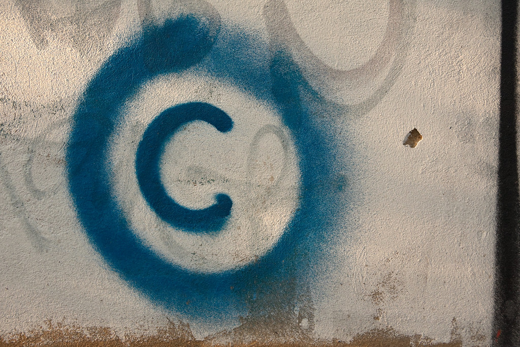 Large copyright graffiti sign on cream colored wall - Flickr