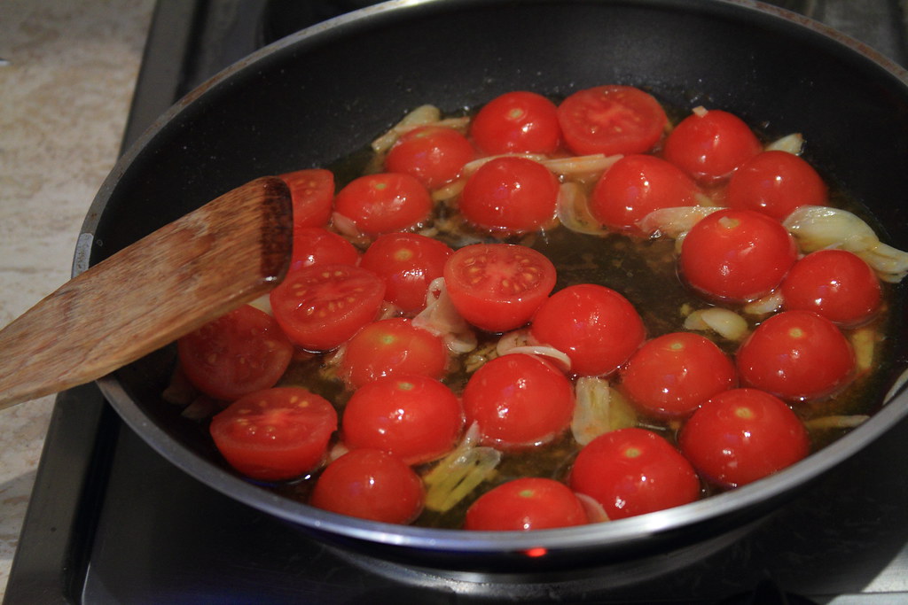 Sautéing Cherry Tomatoes and Garlic