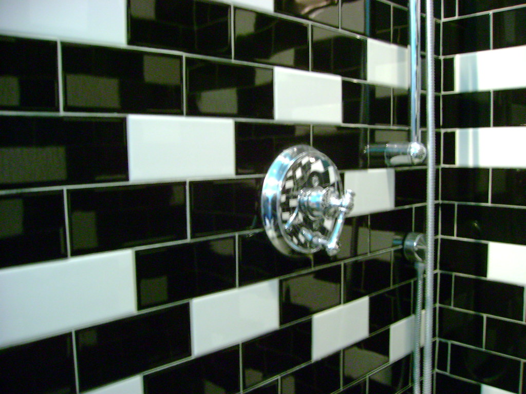 black & white subway tile in random pattern in shower Flickr