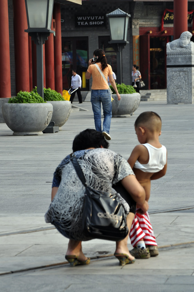 Comfort Stop Boy Takes A Pee In Beijing Street Louis Allen Flickr.