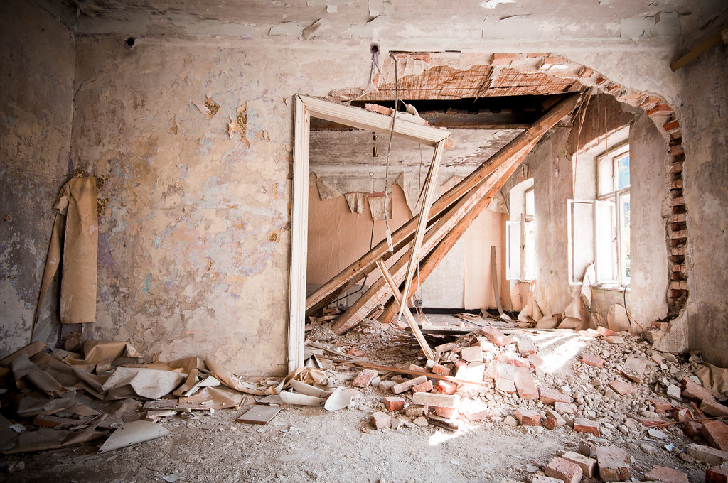 a-broken-house-left-after-a-call-with-a-frame-which-is-o-flickr