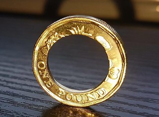 One pound coin with missing center