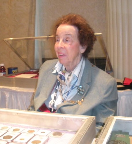 Catherine Bullowa Moore at bourse table at 2011 NY International
