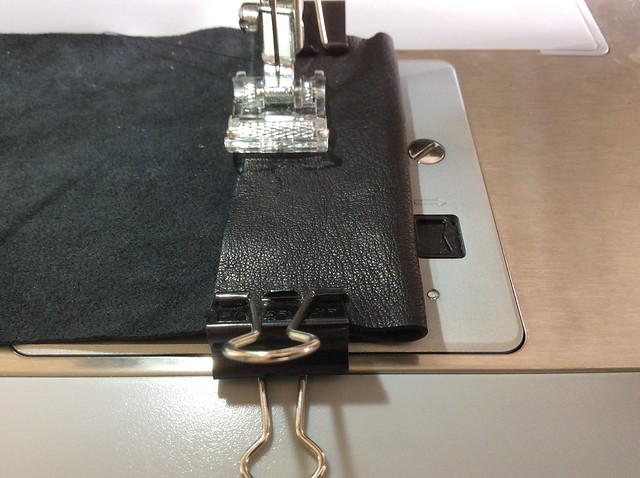 Sewing the cord sleeve on the leather bag