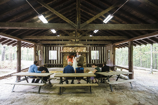 The picnic shelter is the perfect backdrop to say I do! Wedding Photography at Douthat State Park by Craig Spiering Photography. 