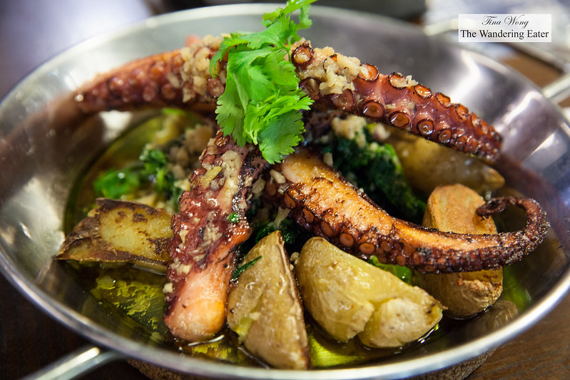 Local octopus cooked with potatoes and greens