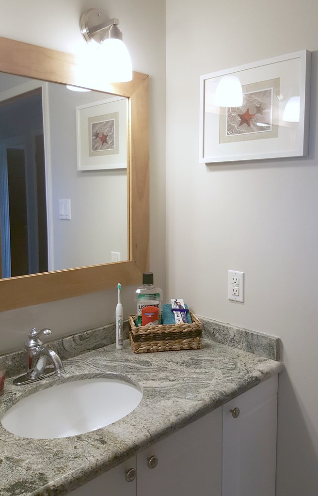 main bathroom after - granite countertop - renovation - custom mirror