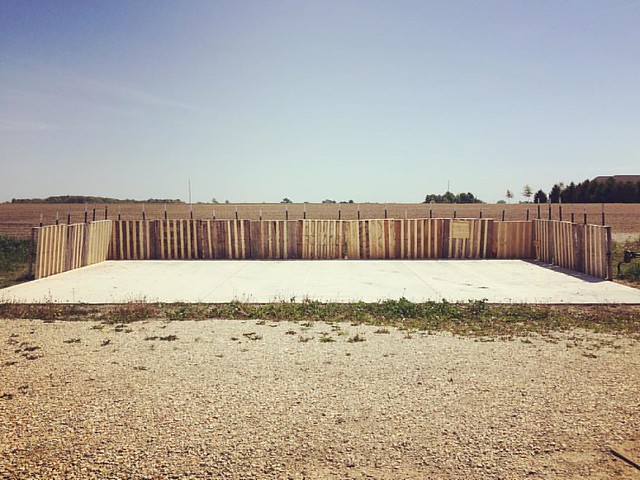 Concrete pad and pallet wall. #keepfertilityonthefarm @breslinfarms #pallets
