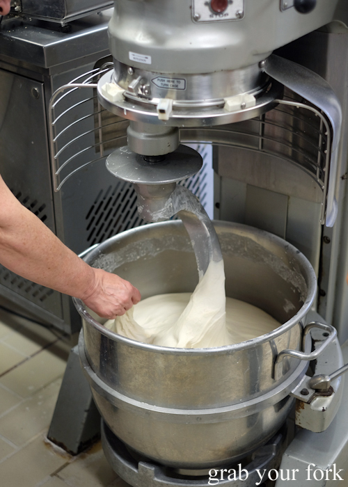 Making bread dough in the commercial mixer 