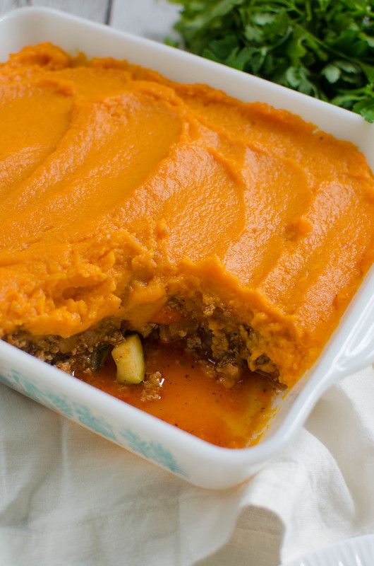 Paleo Shepherd’s Pie - perfect comfort food! Beef and veggies in a rich tomato gravy and topped with mashed sweet potatoes!