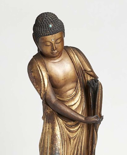 "Bowing Buddha," a gilt wood sculpture from the 17-18th century, is one of the works from Japan in "Heaven and Hell- Salvation and Retribution in Pure Land Buddhism." The exhibit at the San Antonio Museum of Art. from expressnews.com