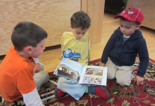 reading to his friends