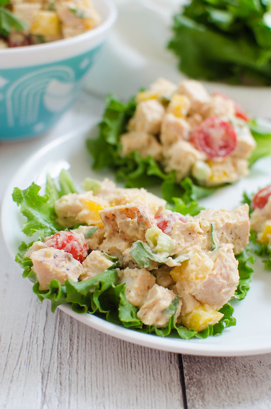 Hummus Turkey Lettuce Wraps - a great no-cook healthy lunch idea! Deli turkey with bell peppers, tomatoes, green onions, and hummus, served in lettuce wraps. 