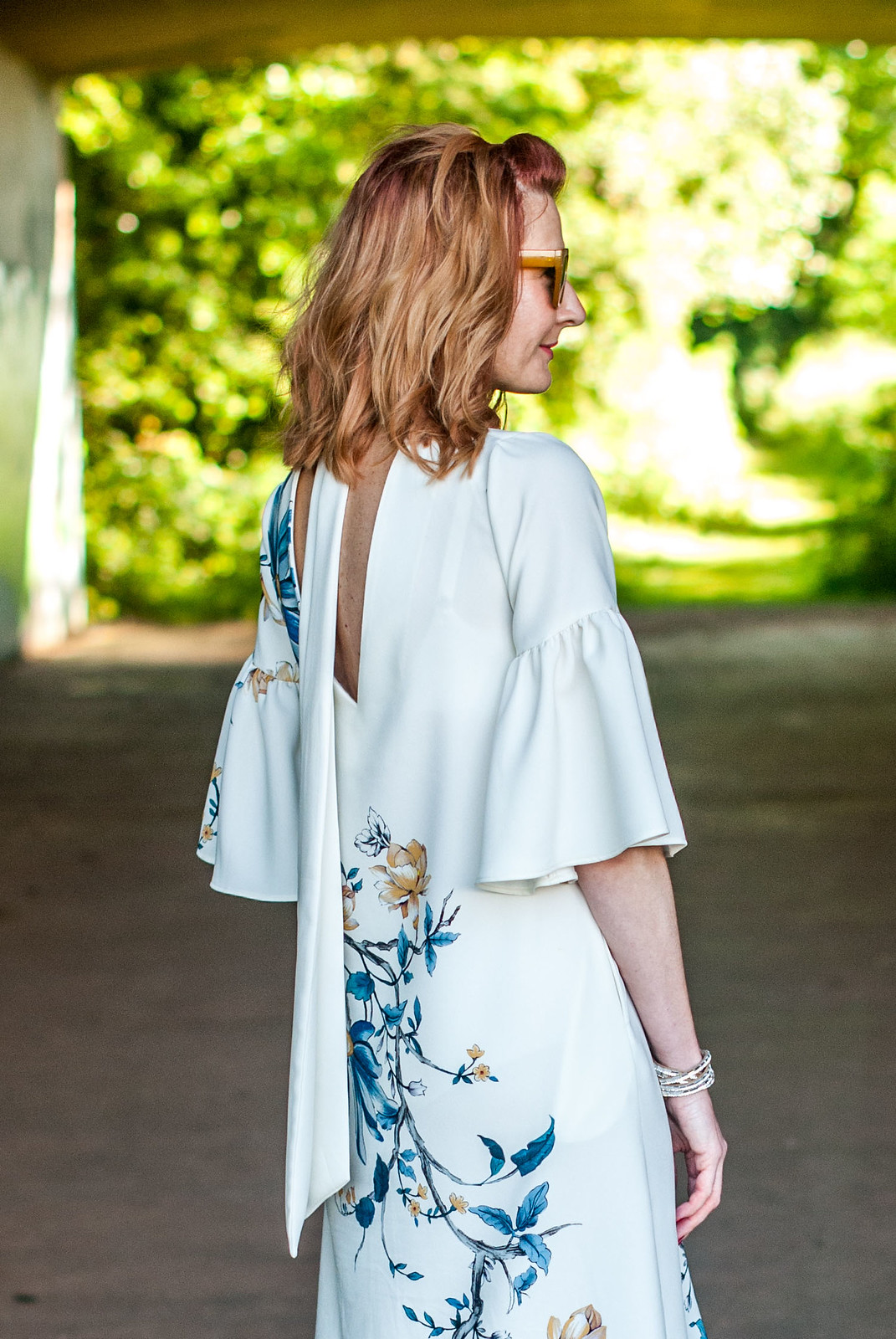 Wedding guest or garden party outfit: Marks & Spencer floral midi dress with flared sleeves nude cage heel mules pearl sunglasses | Not Dressed As Lamb, over 40 style