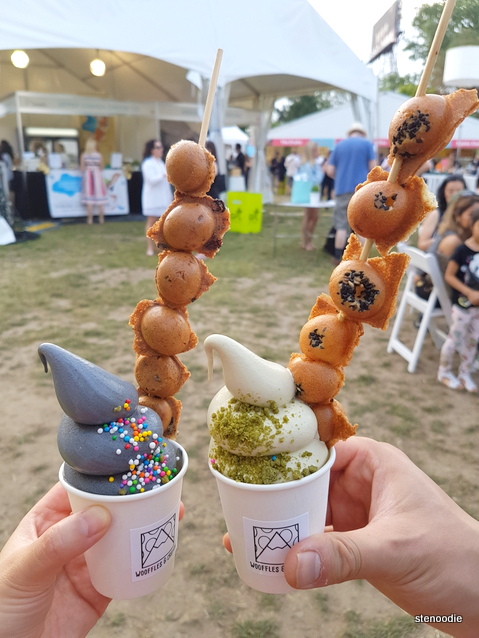 Activated Charcoal Vanilla Soft Serve, Rainbow Sprinkles, Wooffle Skewer, Caramelized Wheat Puffs