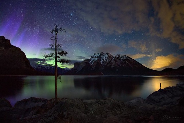 What a night. The aurora display was subdued last night, but the celestial canvas displayed a wide array of colours throughout! Self-portrait, Lake Minnewanka. Canon Canada In the Starlight
