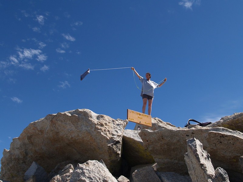 Vicki flying her homemade bandanna-kite from the San Jacinto Peak summit block