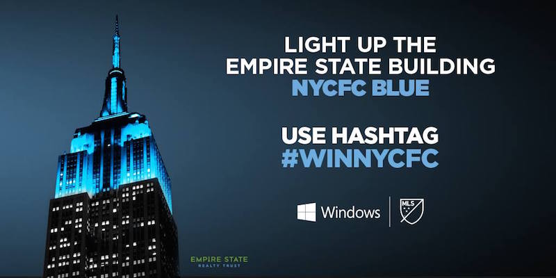 Empire State Building lit up in CITY Blue.