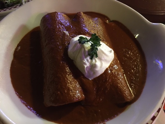 Mole enchiladas. From 7 Mole Lessons from Salt Lake City’s Storied Red Iguana Restaurant