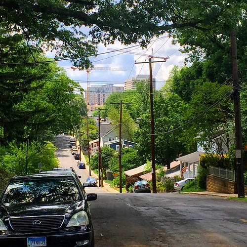 wherever you go in #silverspring it feels like the skyline is always there. I find it comforting—I grew up in one of the tall buildings, and when I see them I remember that this is where I came from and where I belong. #latergram #hills #skyline