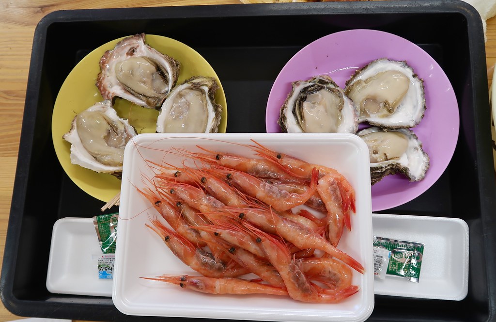 Морепродукты сахалин. Морепродукты в Японии. Морепродукты Японии фото. Кукса Сифуд Япония. Жареный лосось Япония.