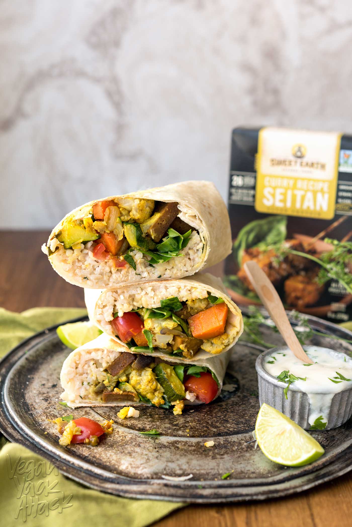 This Curry Cauliflower Burrito is easy-to-make, filled with awesome flavors, and can even be frozen for weekly lunches! Made with delicious Sweet Earth Foods’ Curry Satay. Mmm.. #vegan #nutfree #veganyackattack