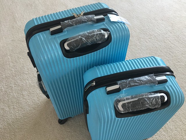 aqua blue set of luggage