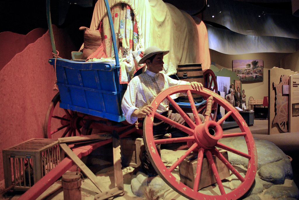 Trail emigrant repairing wagon wheel, National Historic Trails Interpretive Center, Casper, Wyoming, July 11, 2010