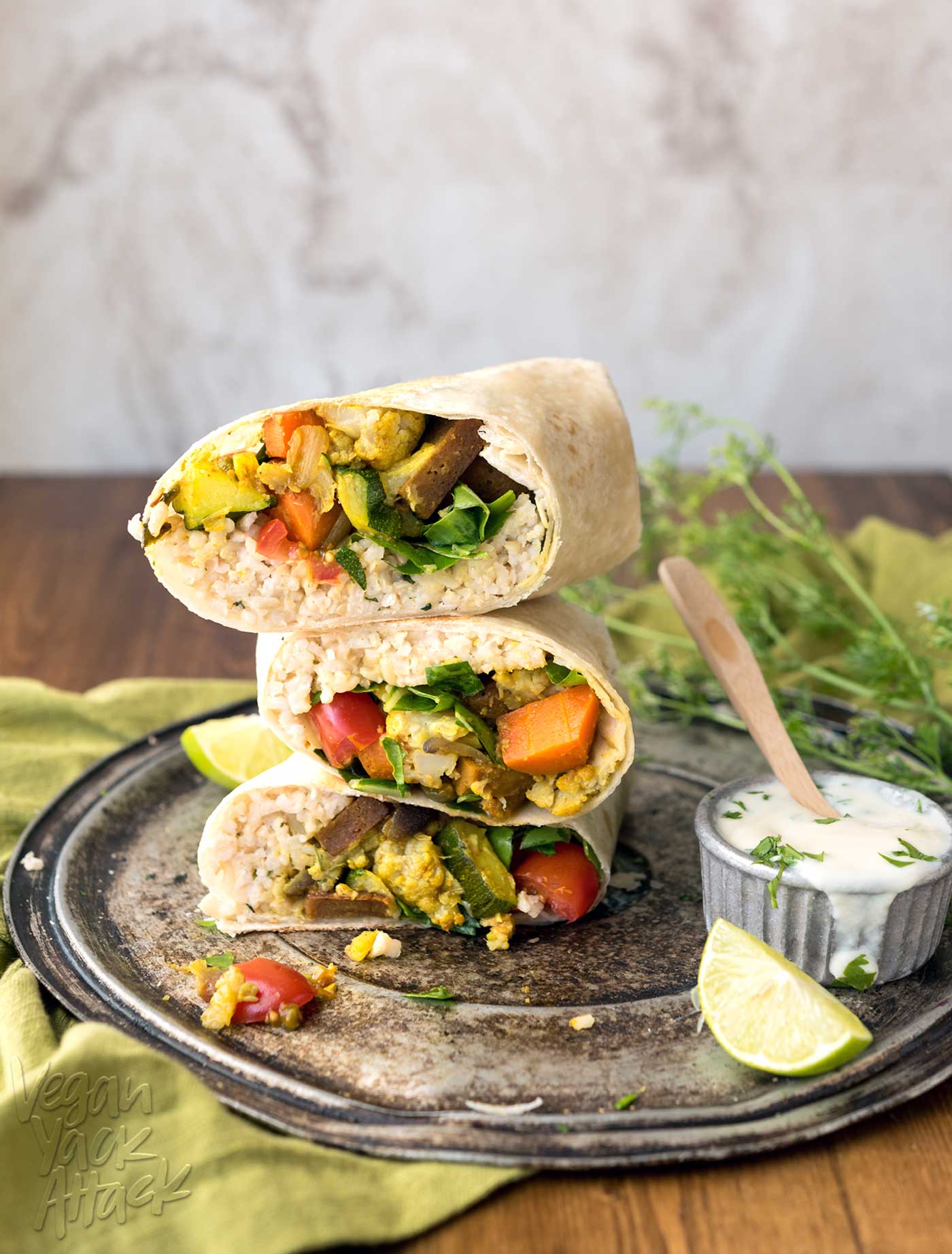 This Curry Cauliflower Burrito is easy-to-make, filled with awesome flavors, and can even be frozen for weekly lunches! Made with delicious Sweet Earth Foods’ Curry Satay. Mmm.. #vegan #nutfree #veganyackattack